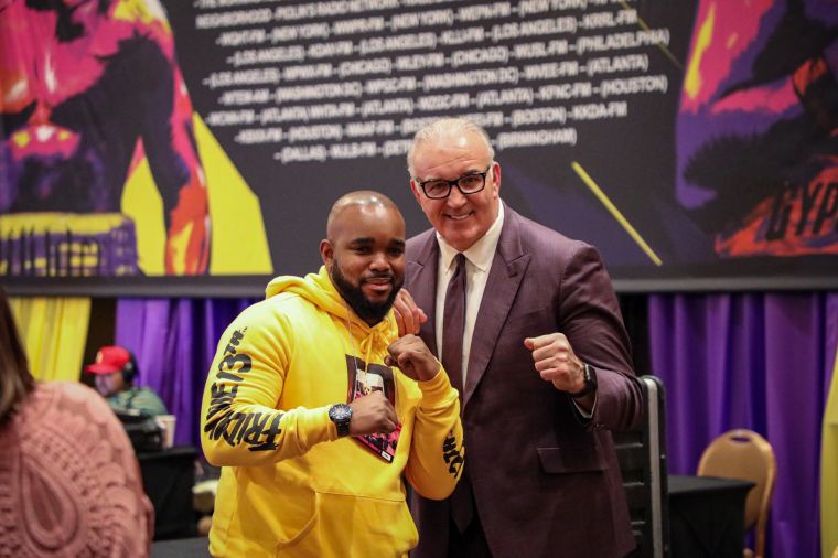 Surrounded by boxing legends.