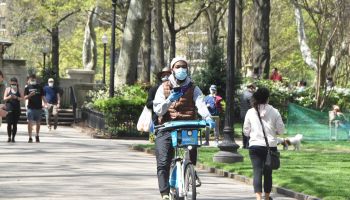 People enjoy the spring weather while maintaining social-distancing in Philadelphia, United States during the Covid-19 pandemic