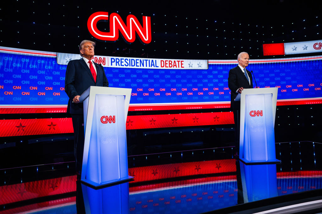 Atlanta, Georgia - June 27: Former president Donald Trump (left